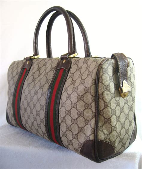 authentic Gucci duffle bags